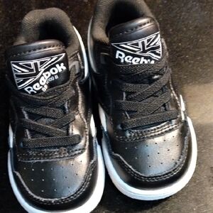 Reebok Black and White Sneakers with shorts To match